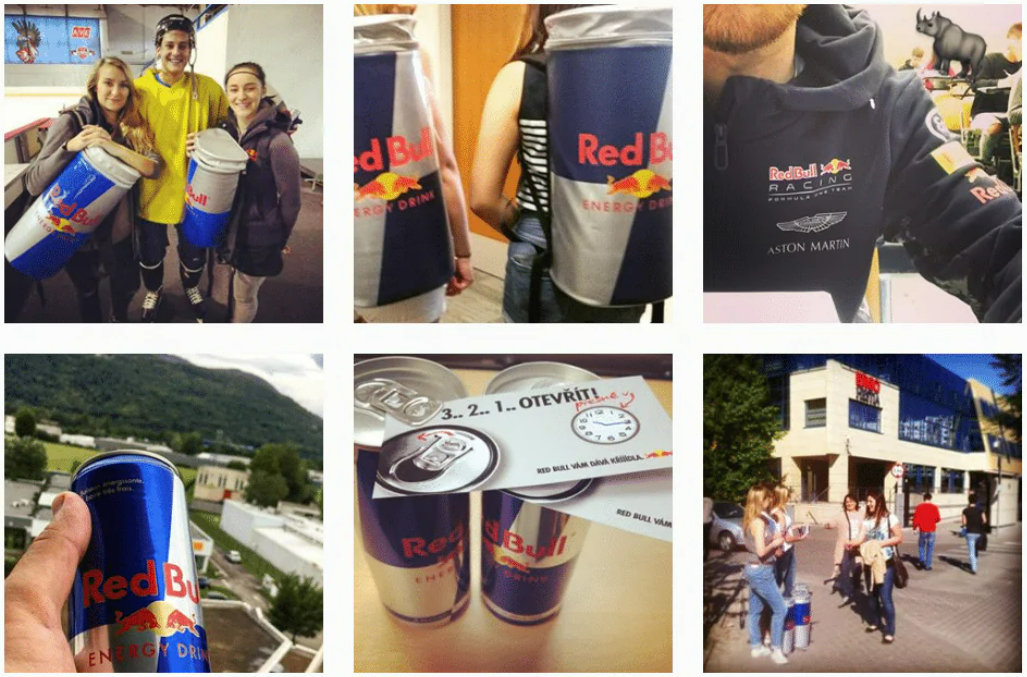 Red Bull student ambassadors with Red Bull cans on campus