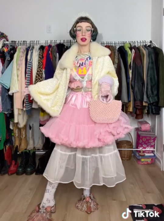 Maximalist fashion influencer in a colourful outfit on TikTok