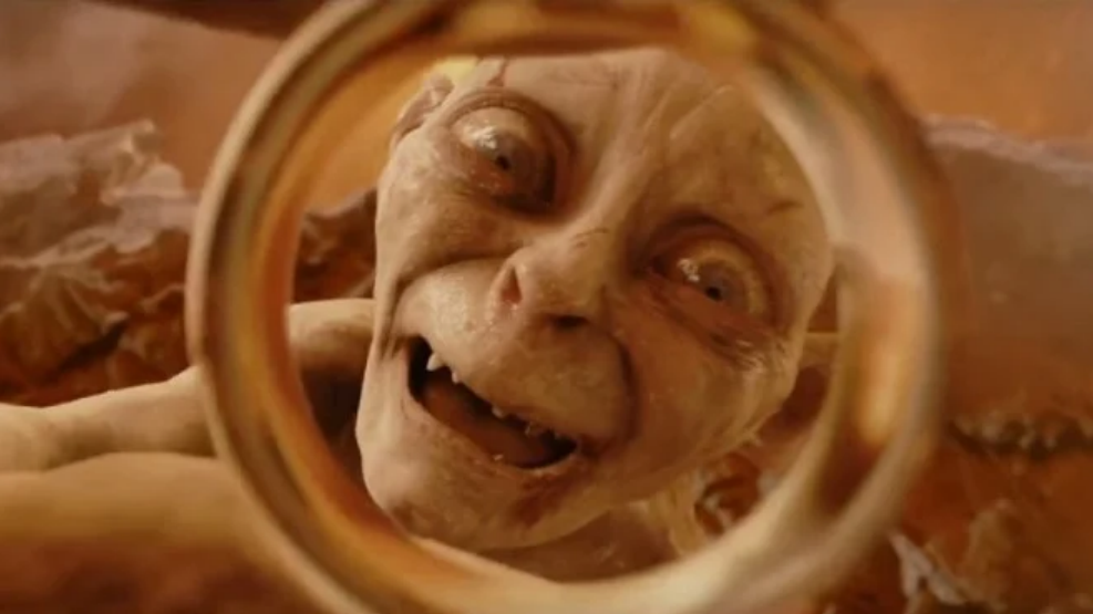 Close-up of Gollum from Lord of the Rings holding the ring, used as a meme