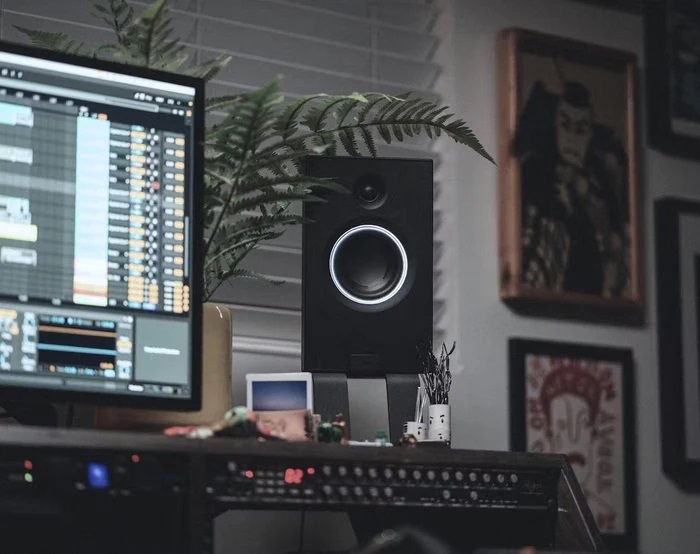 Home music studio with monitor speaker and recording software