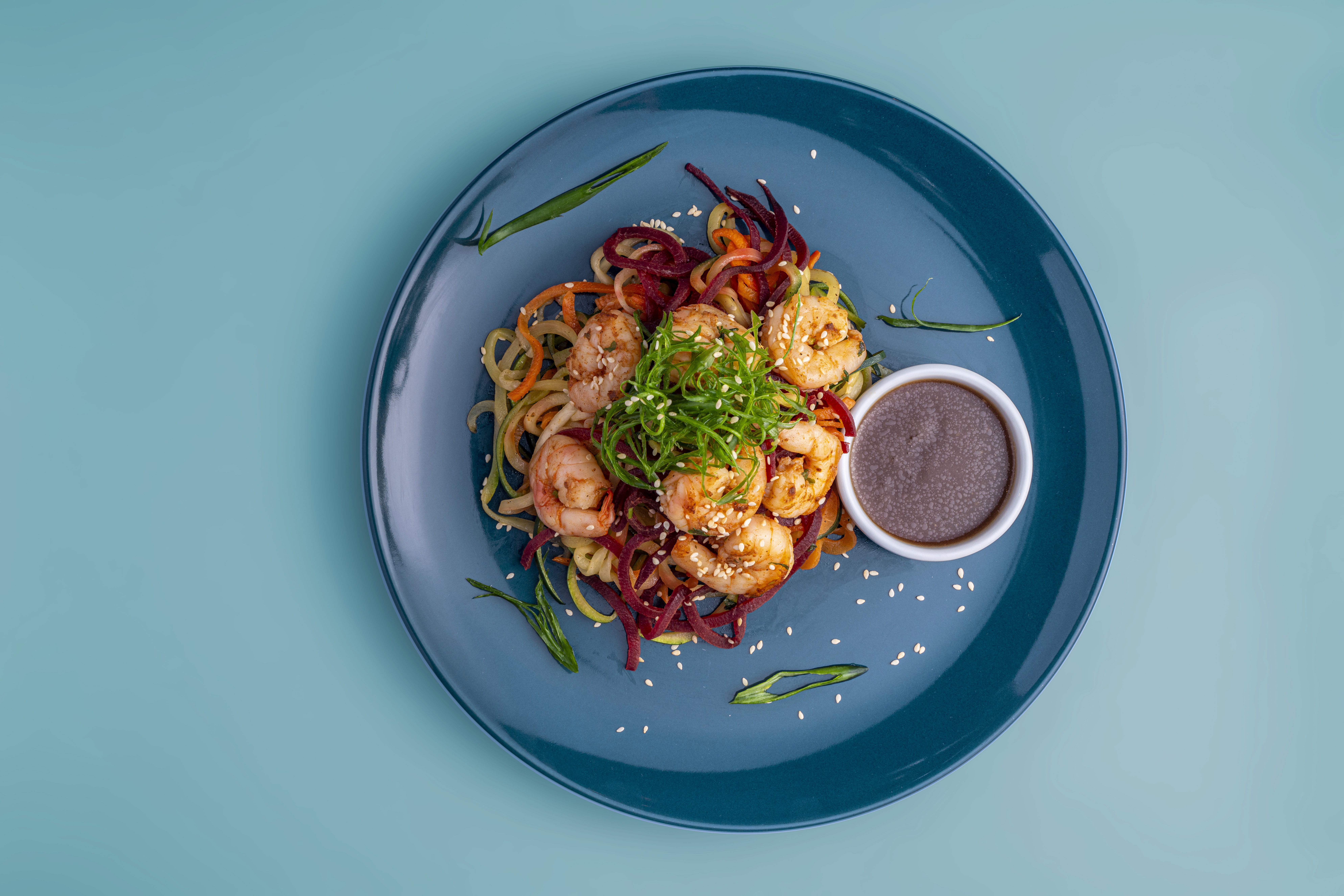 Fitlab shrimp noodle meal on a blue plate